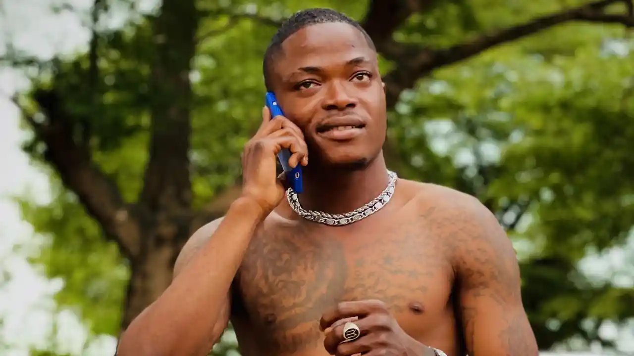 TikToker Flapacha Premier in a promotional video, showcasing his vibrant personality and engaging content.