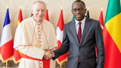 Olushegun Bakari and Cardinal Parolin during a diplomatic meeting in Benin.
