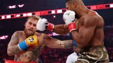 Anthony Joshua lands a right cross on Jake Paul. Photo: Ed Mulholland/Getty Images