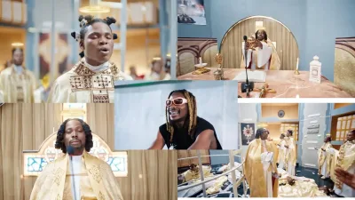 Asake, chanteur nigérian, en pleine performance sur scène, captivant son public.