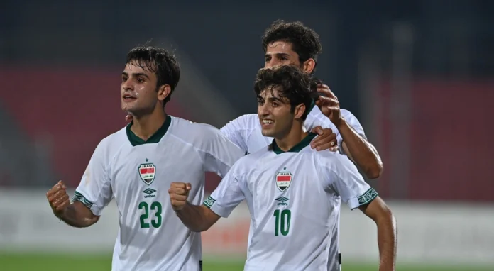 Des Irakiens U23 célèbrent leur but