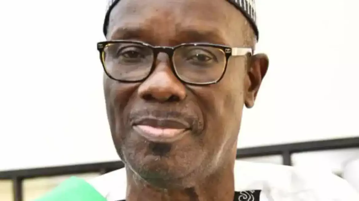 Basile Ahossi, candidat aux élections législatives de 2026, portrait sérieux.