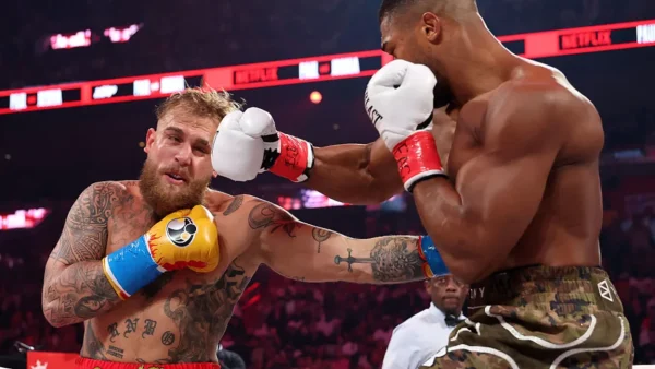 Anthony Joshua lands a right cross on Jake Paul. Photo: Ed Mulholland/Getty Images