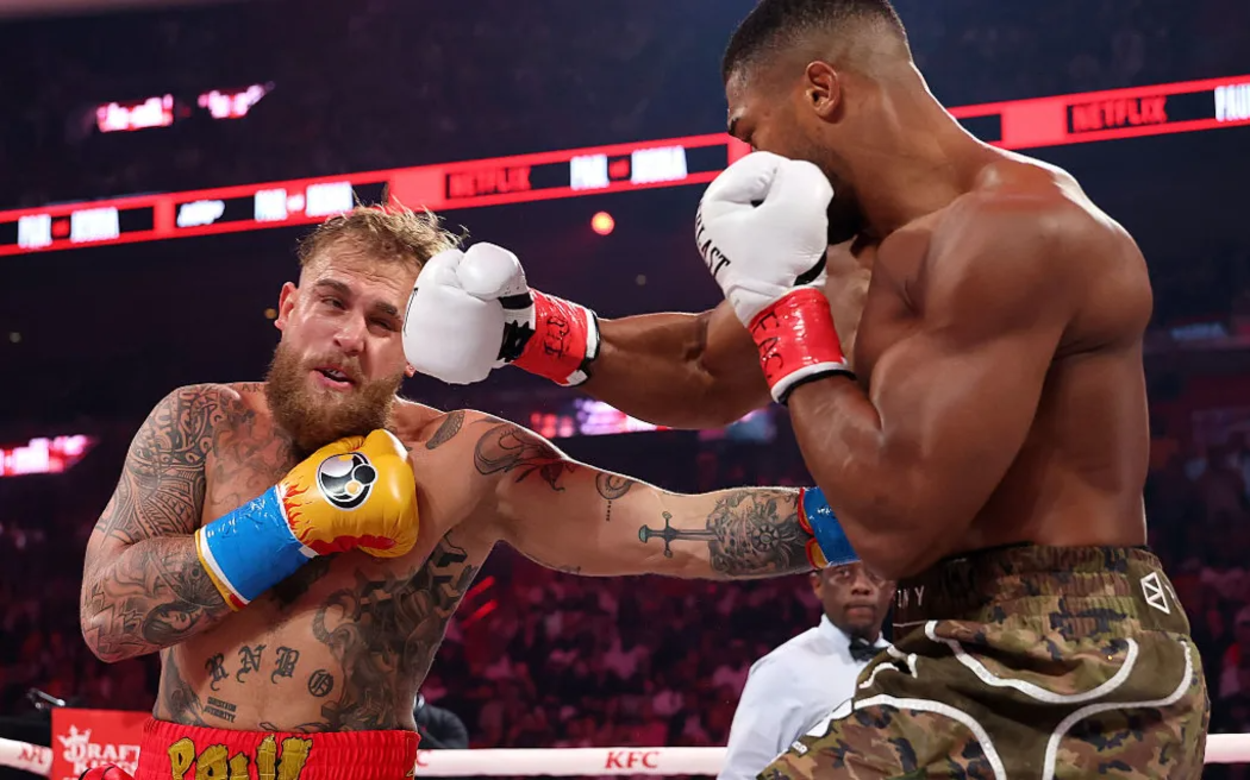 Anthony Joshua lands a right cross on Jake Paul. Photo: Ed Mulholland/Getty Images