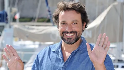 ce métier improbable à Disneyland avant ses débuts avec Jean Dujardin