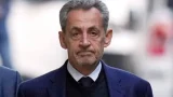 Nicolas Sarkozy quittant son domicile le 21 octobre 2025 à Paris, pour se rendre en prison afin de purger une peine pour association de malfaiteurs • THIBAULT CAMUS / AP / SIPA