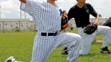 Jeune joueur lors d’une séance d’entraînement de baseball